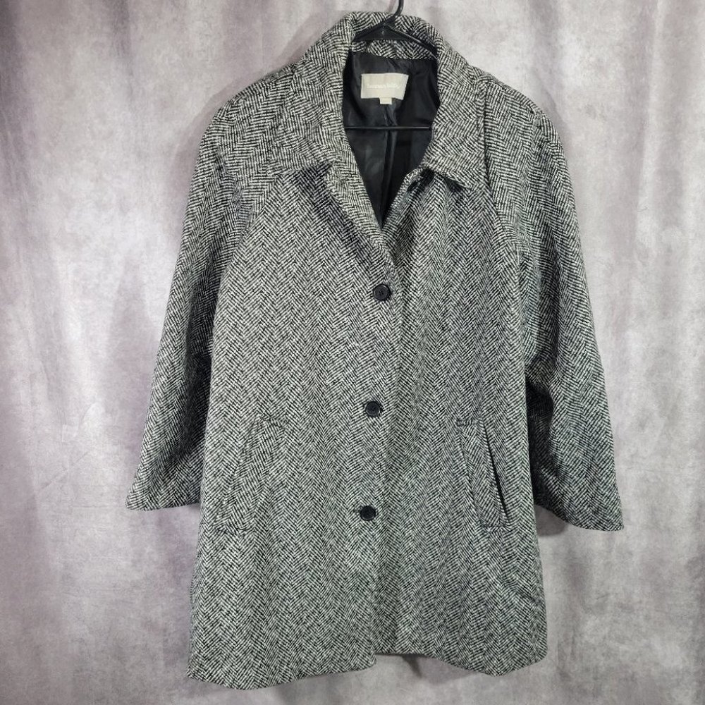 Woman Within Black and White Herringbone Coat